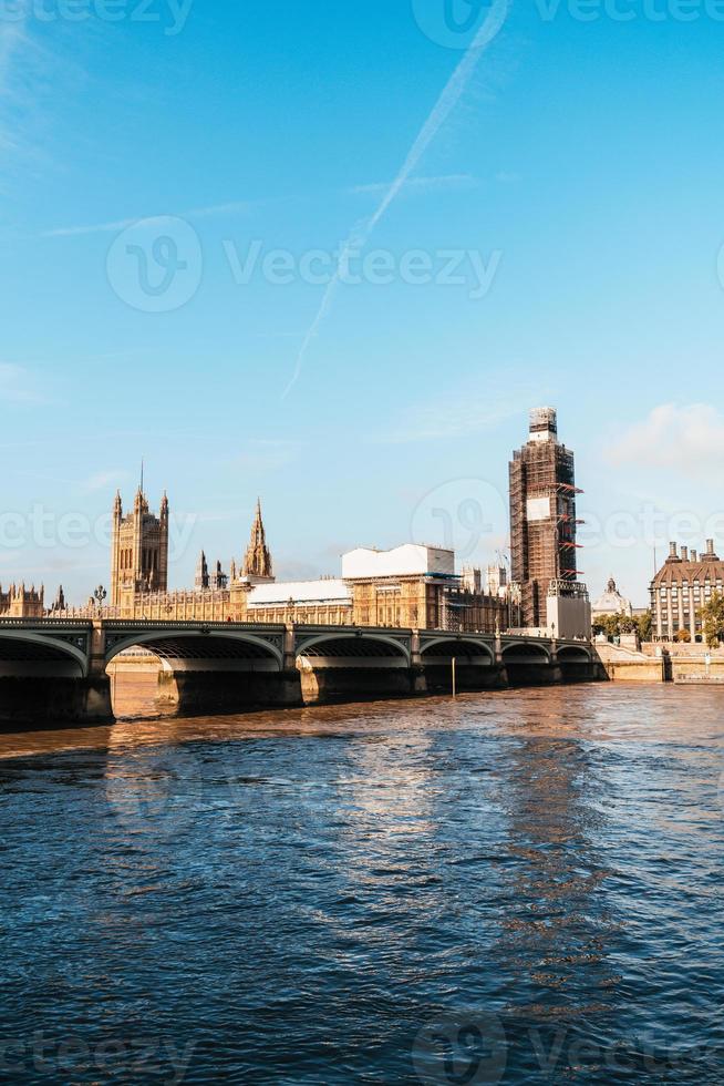 Big Ben and Westminster Bridge in London, UK photo