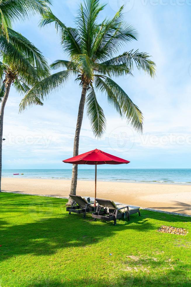 Umbrella and chair  with sea ocean view in hotel resort photo