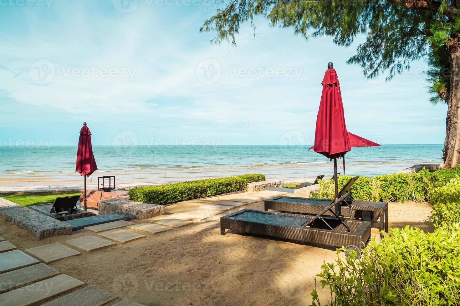 Umbrella and chair  with sea ocean view in hotel resort photo