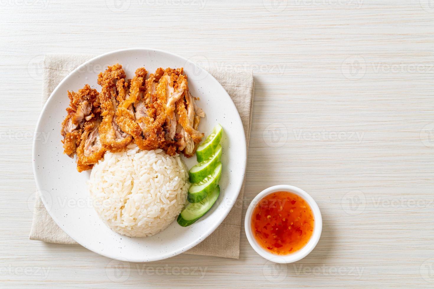 Hainanese chicken rice with fried chicken photo