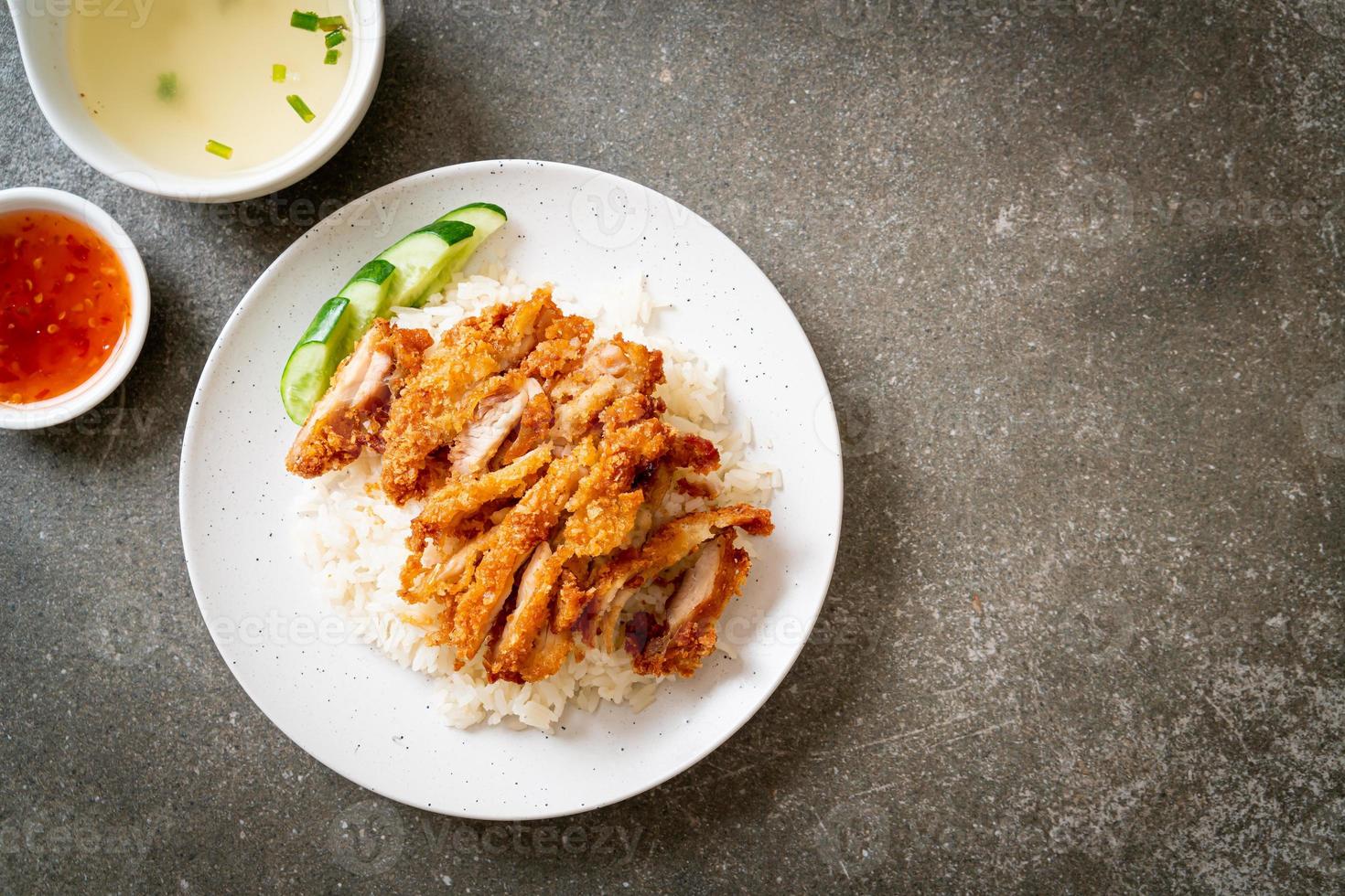 Hainanese chicken rice with fried chicken photo