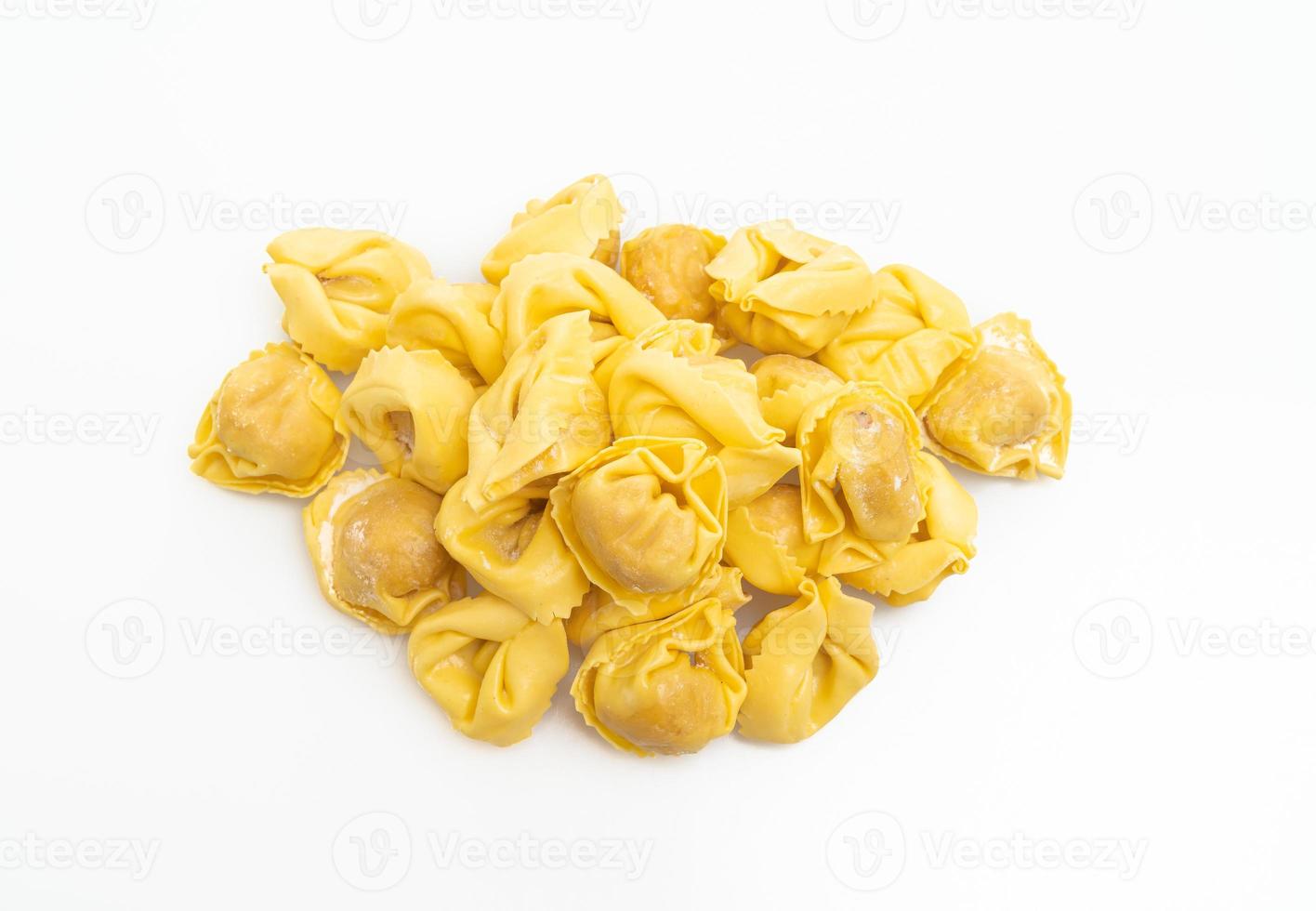 Italian traditional tortellini pasta on white background photo