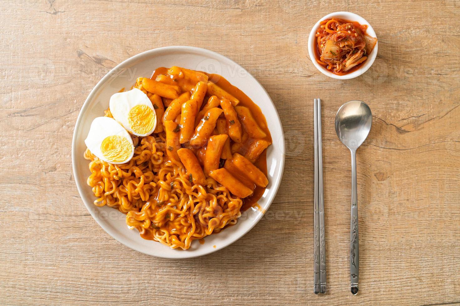 Rabokki or Ramen or Korean instant noodle and Tteokbokki in spicy korean sauce photo