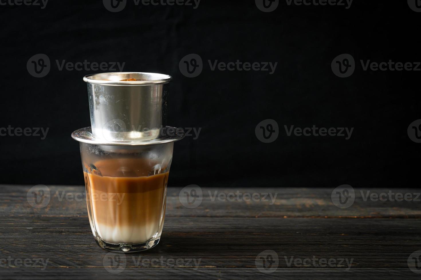 Hot milk coffee dripping in Vietnam style photo