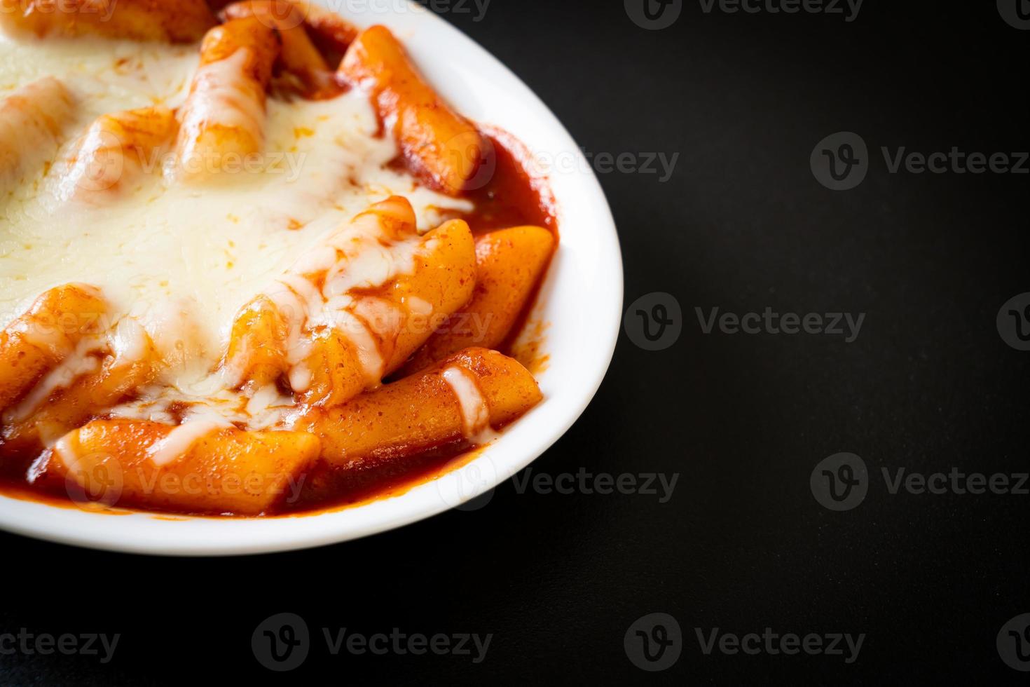 Korean rice cake in spicy Korean sauce with cheese, Cheese Tokpokki, Tteokbokki with Cheese photo