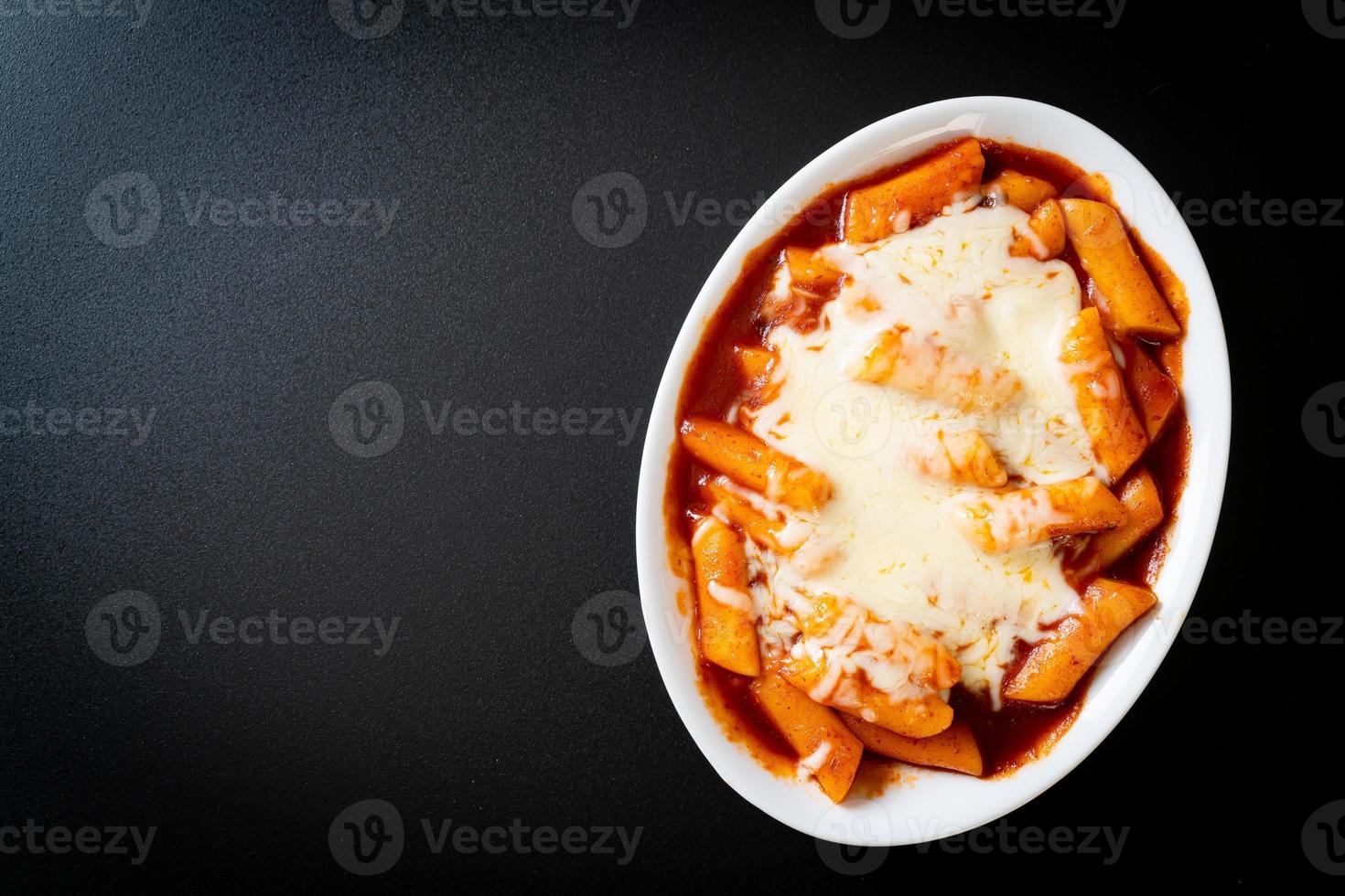 Korean rice cake in spicy Korean sauce with cheese, Cheese Tokpokki, Tteokbokki with Cheese photo