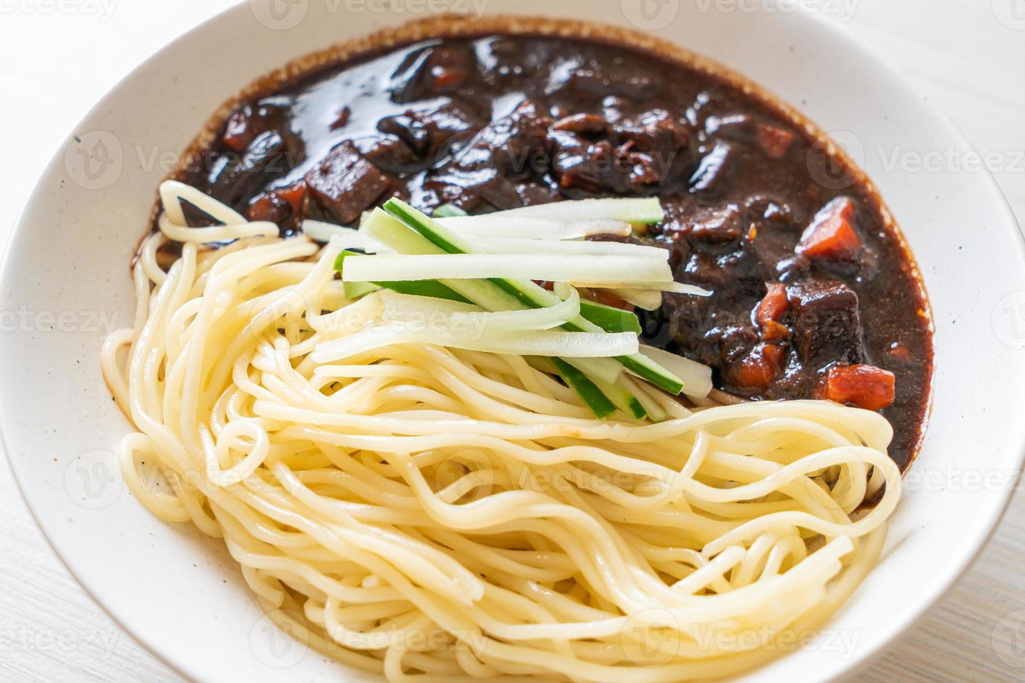 Jajangmyeon or JJajangmyeon is Korean Noodle with Black Sauce photo