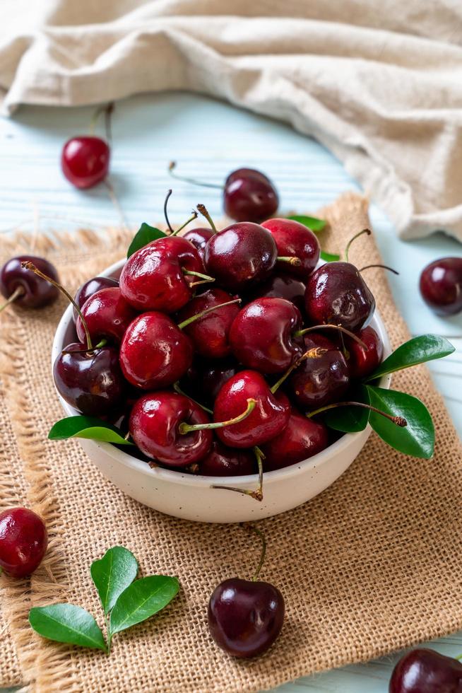 Fresh cherries in bowl photo