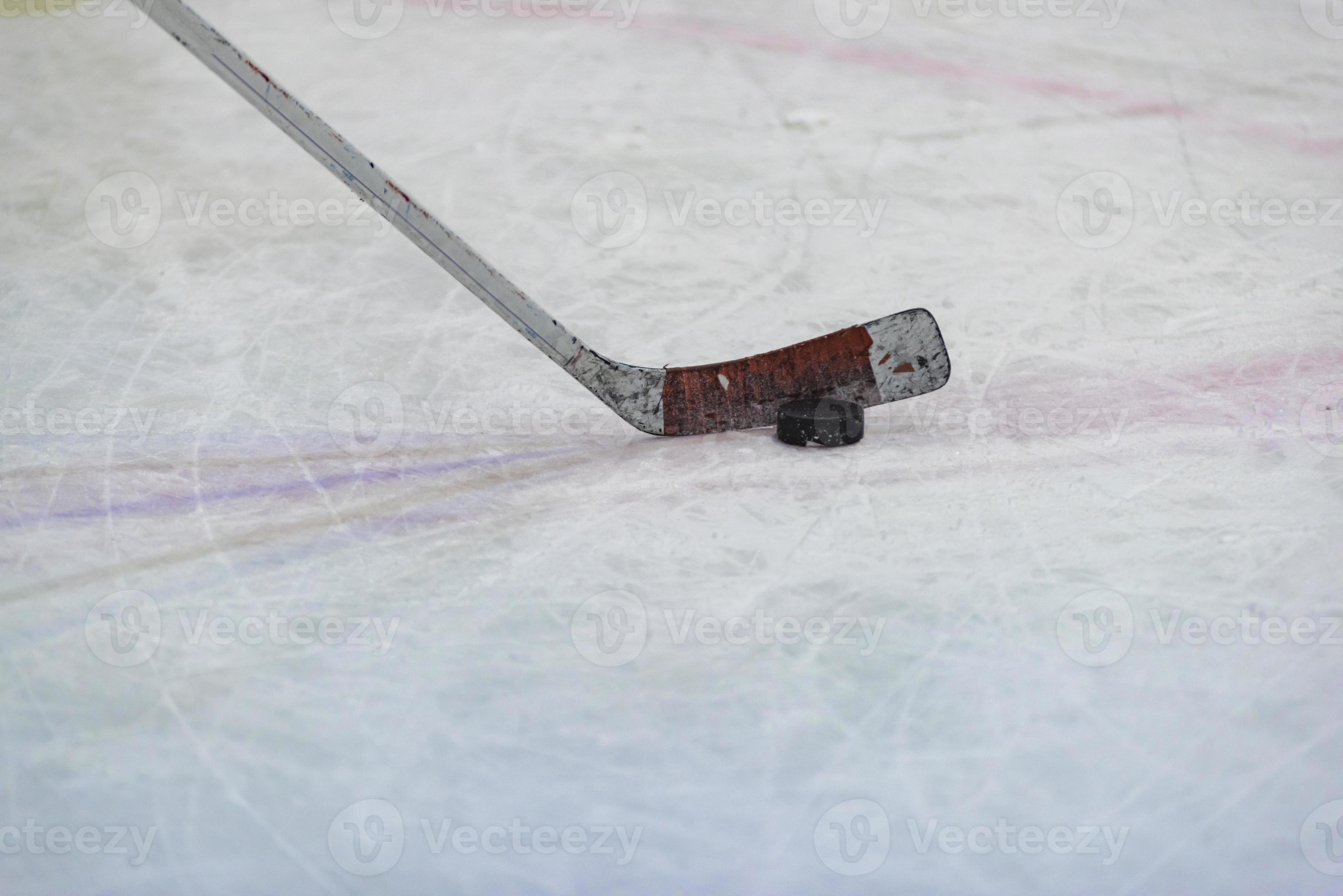 Hockey puck on the ice 2707536 Stock Photo at Vecteezy