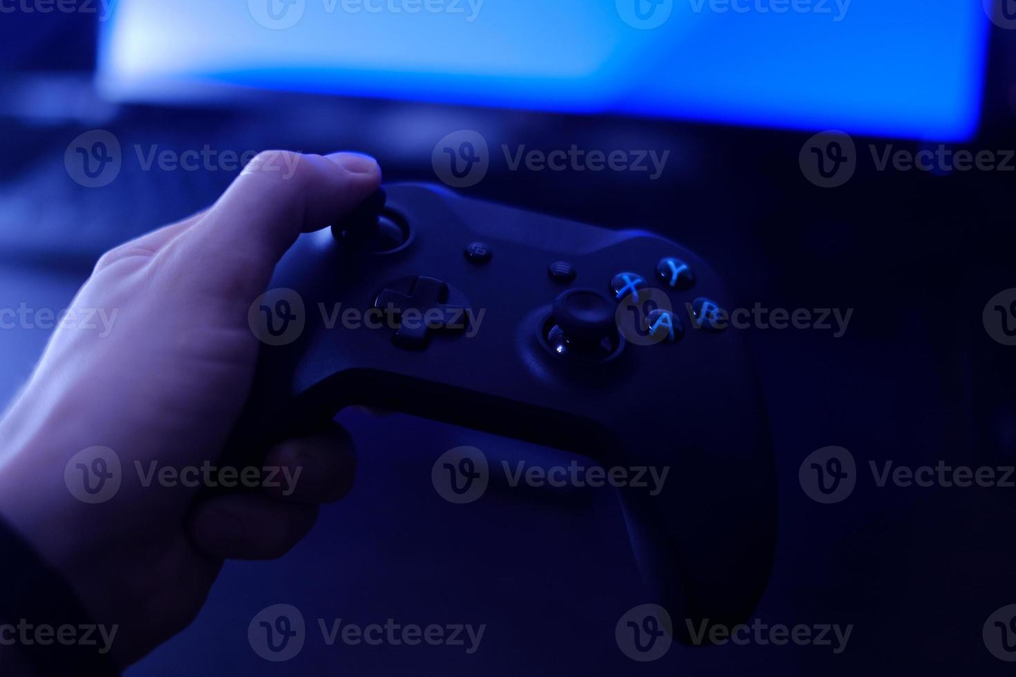Gamepad, game controller in the hand photo