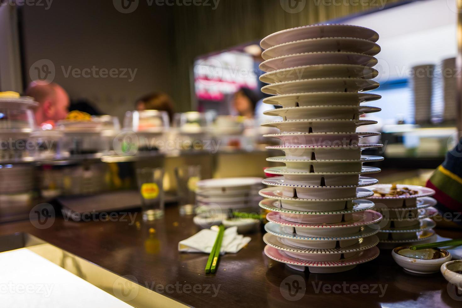 Sushi plates in Japanese Restaurant photo