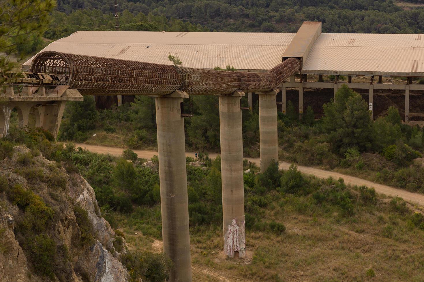 Kilometre-long conveyor belt for transporting stones from the quarry to the plant photo