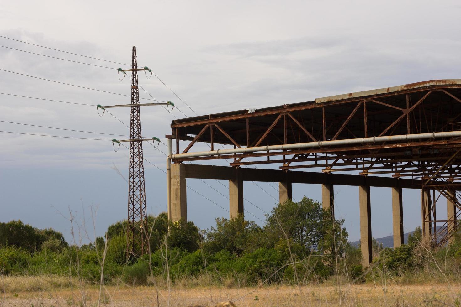 High quality images of high voltage poles on mountain top photo