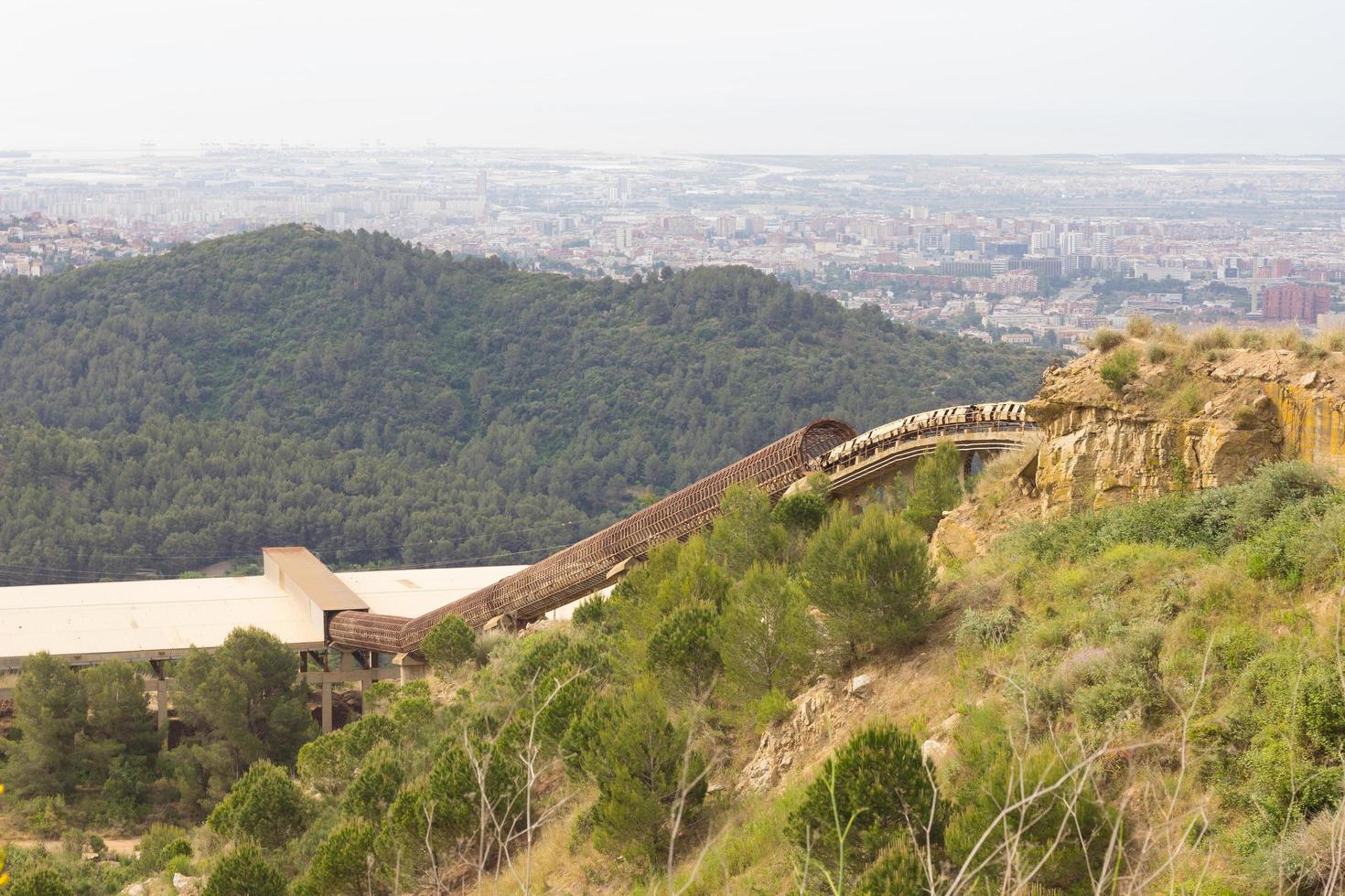 Kilometre-long conveyor belt for transporting stones from the quarry to the plant photo