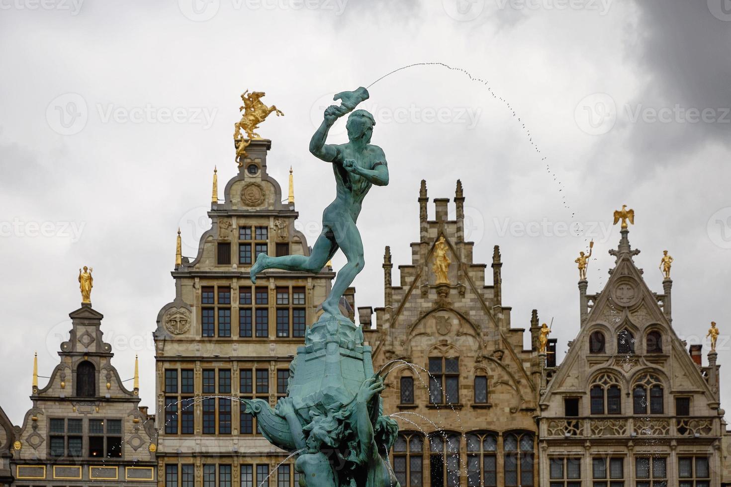 Brabo fountain and traditional flemish architecture at Grote Markt square in Antwerp in Belgium photo
