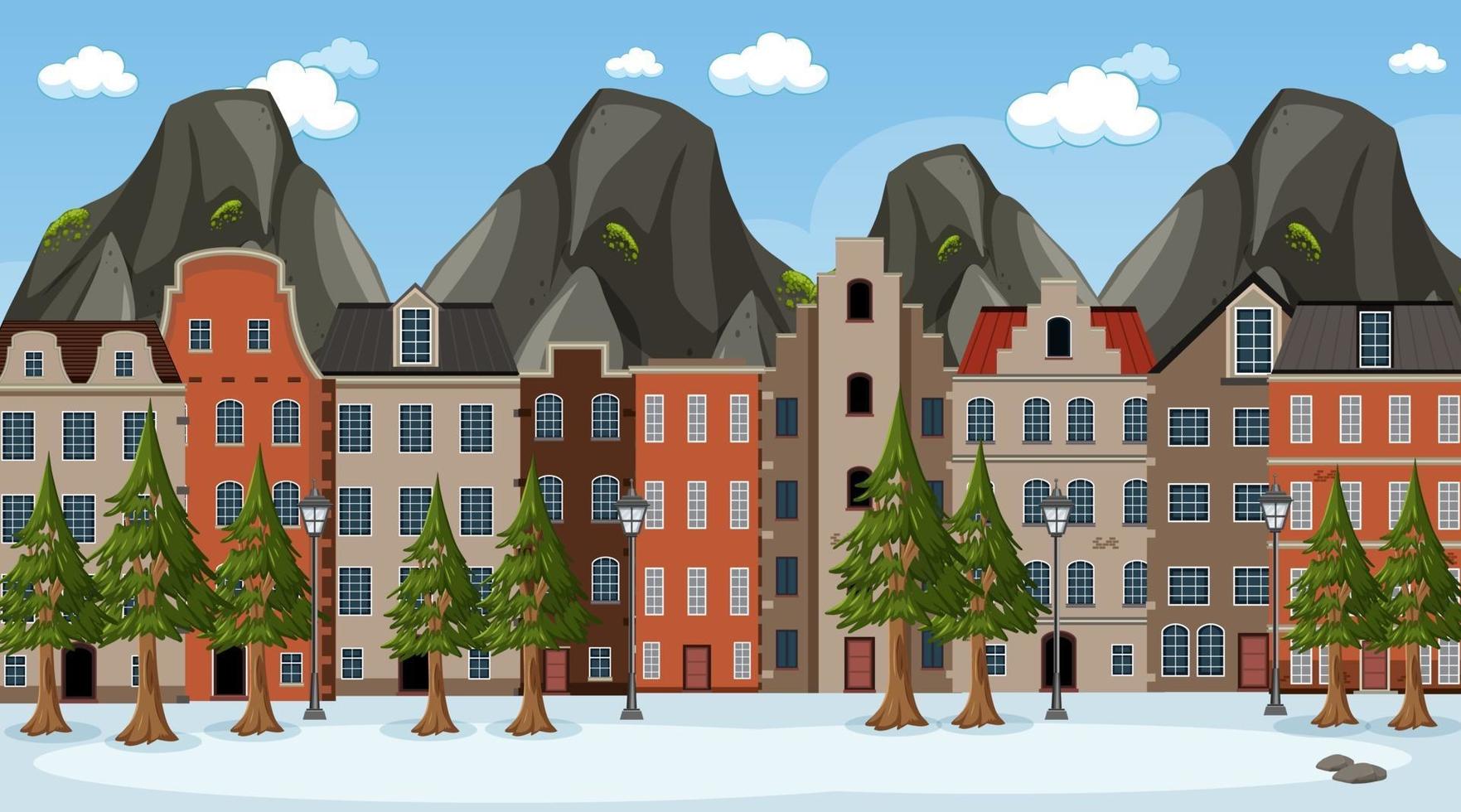 escena de la temporada de invierno con muchos edificios a lo largo de la carretera vector