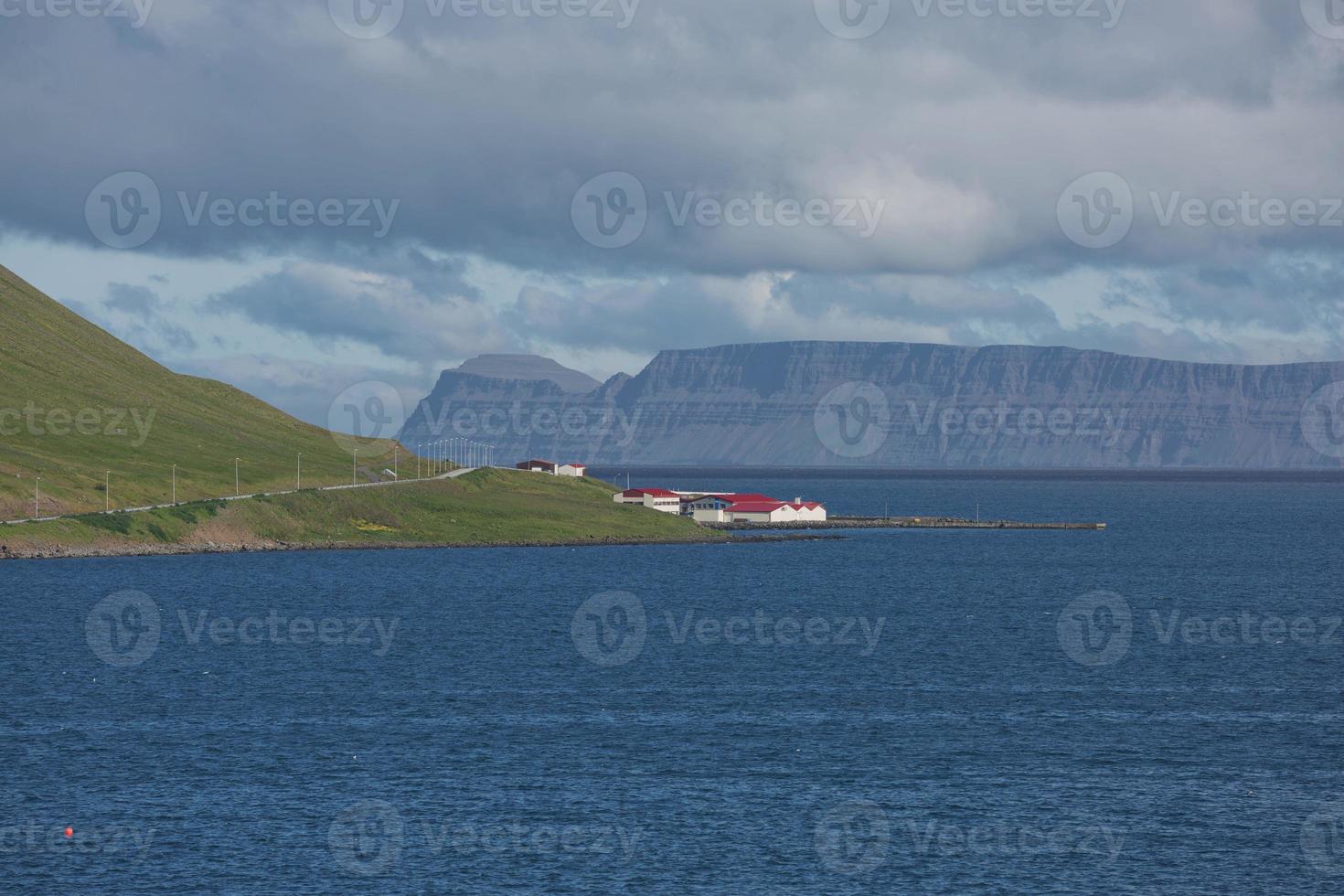 View of the fjord surrounding the village of Isafjordur in Iceland photo