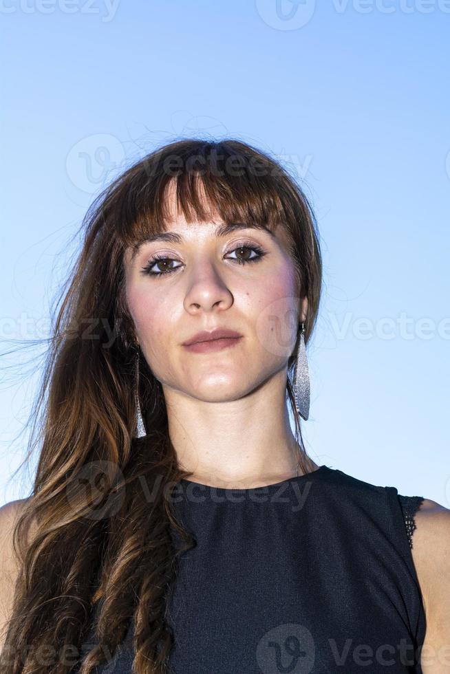 portrait of an italian girl with sky background photo