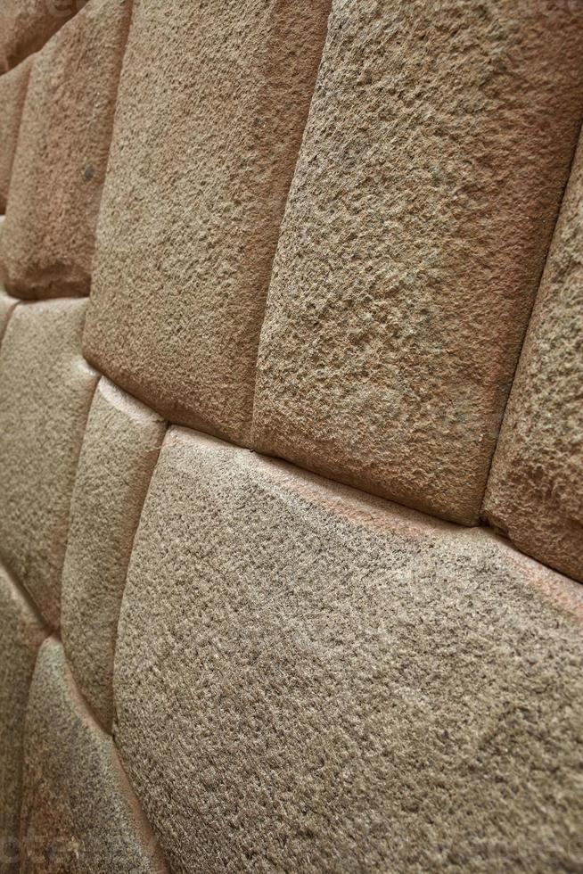 Detalle de la muralla inca en la ciudad de Cusco, Peru. foto