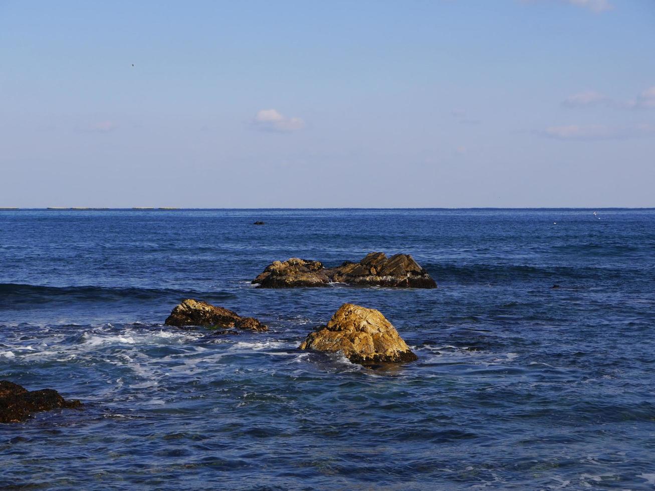 Stones in the sea. Sokcho city. South Korea photo