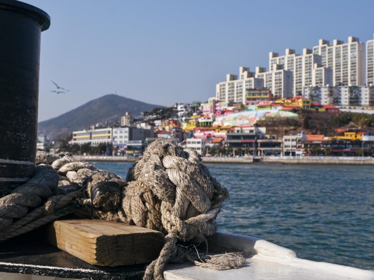 The ship in the bay of Yeosu city and buildings on the background. South Korea photo