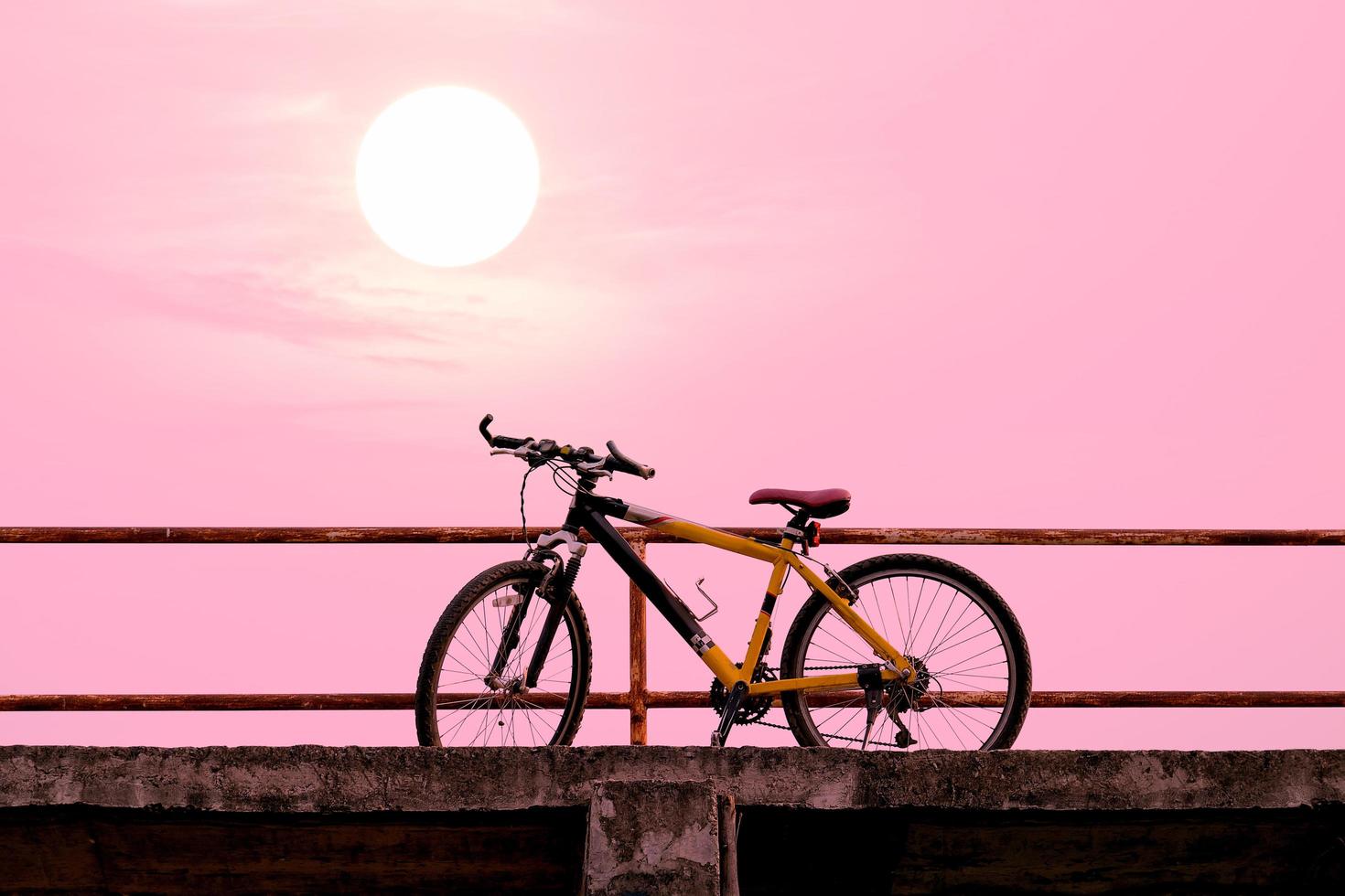 Beautiful mountain bike on concrete bridge. photo