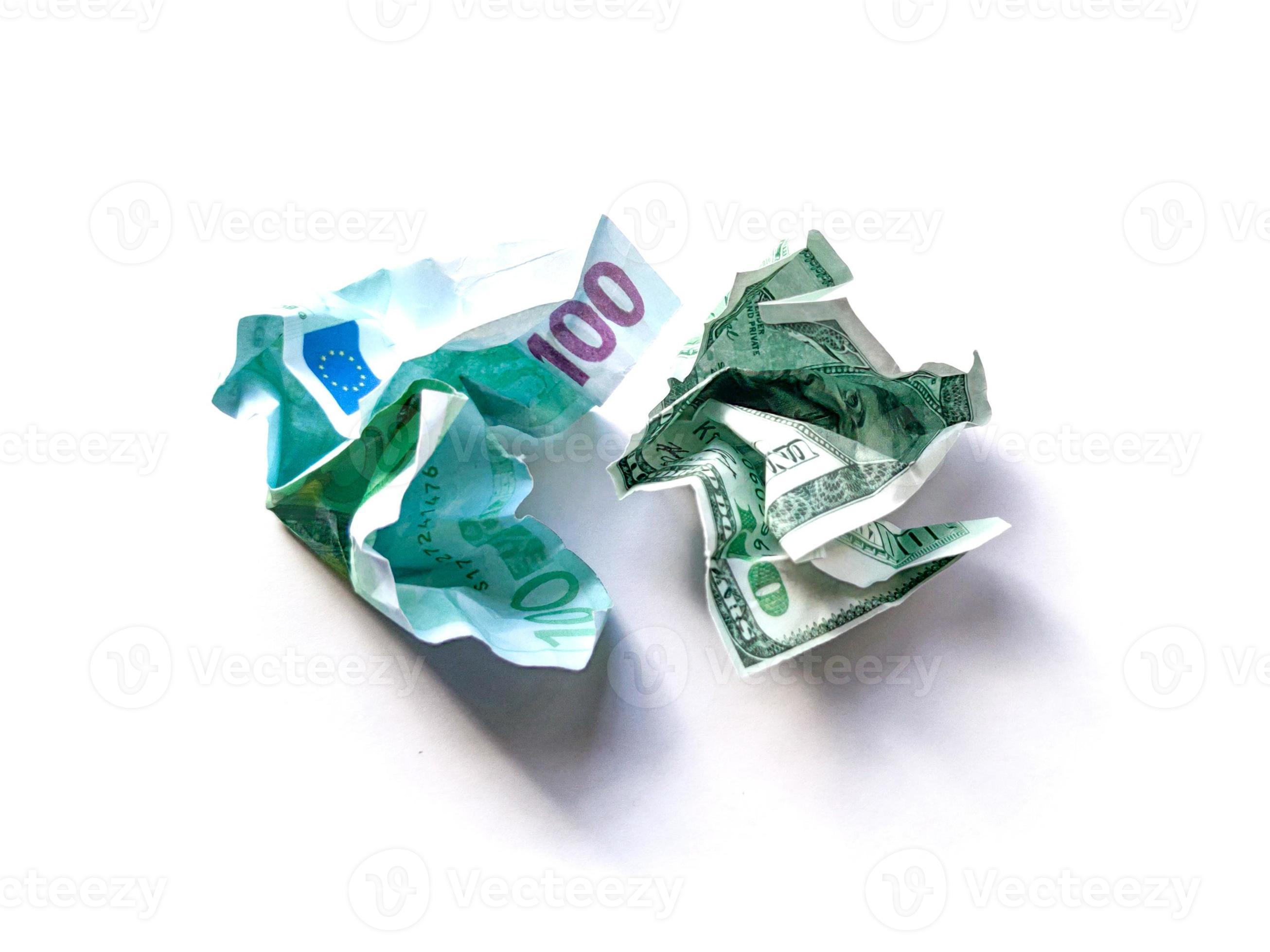 Crumpled dollars and euros bills macro shot with white background