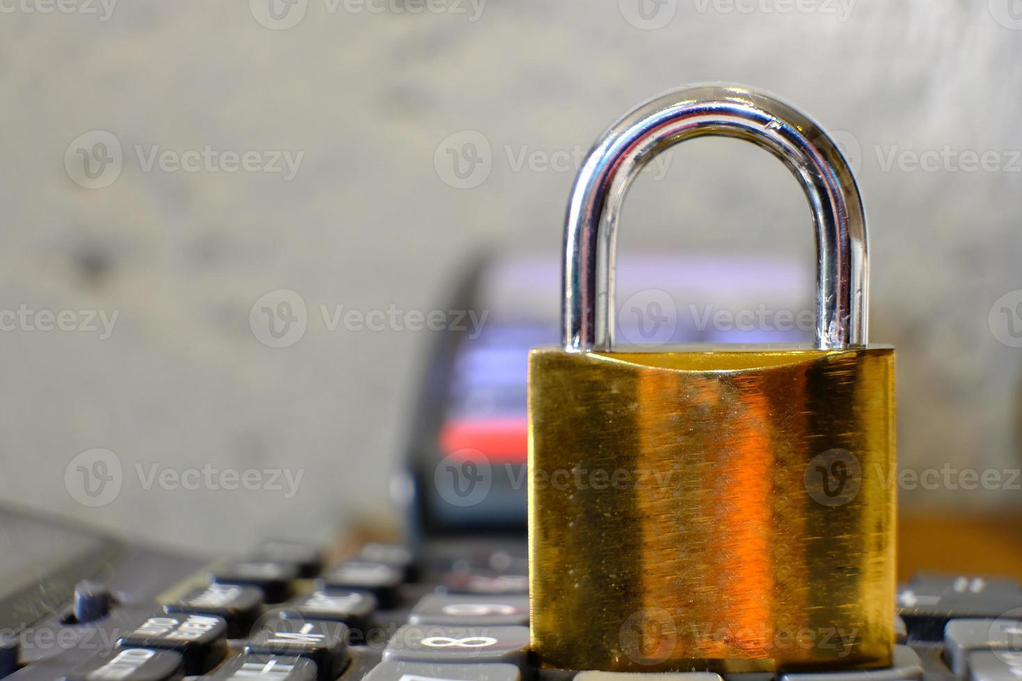 Padlock on table background and business security concept, protecting data personal information photo