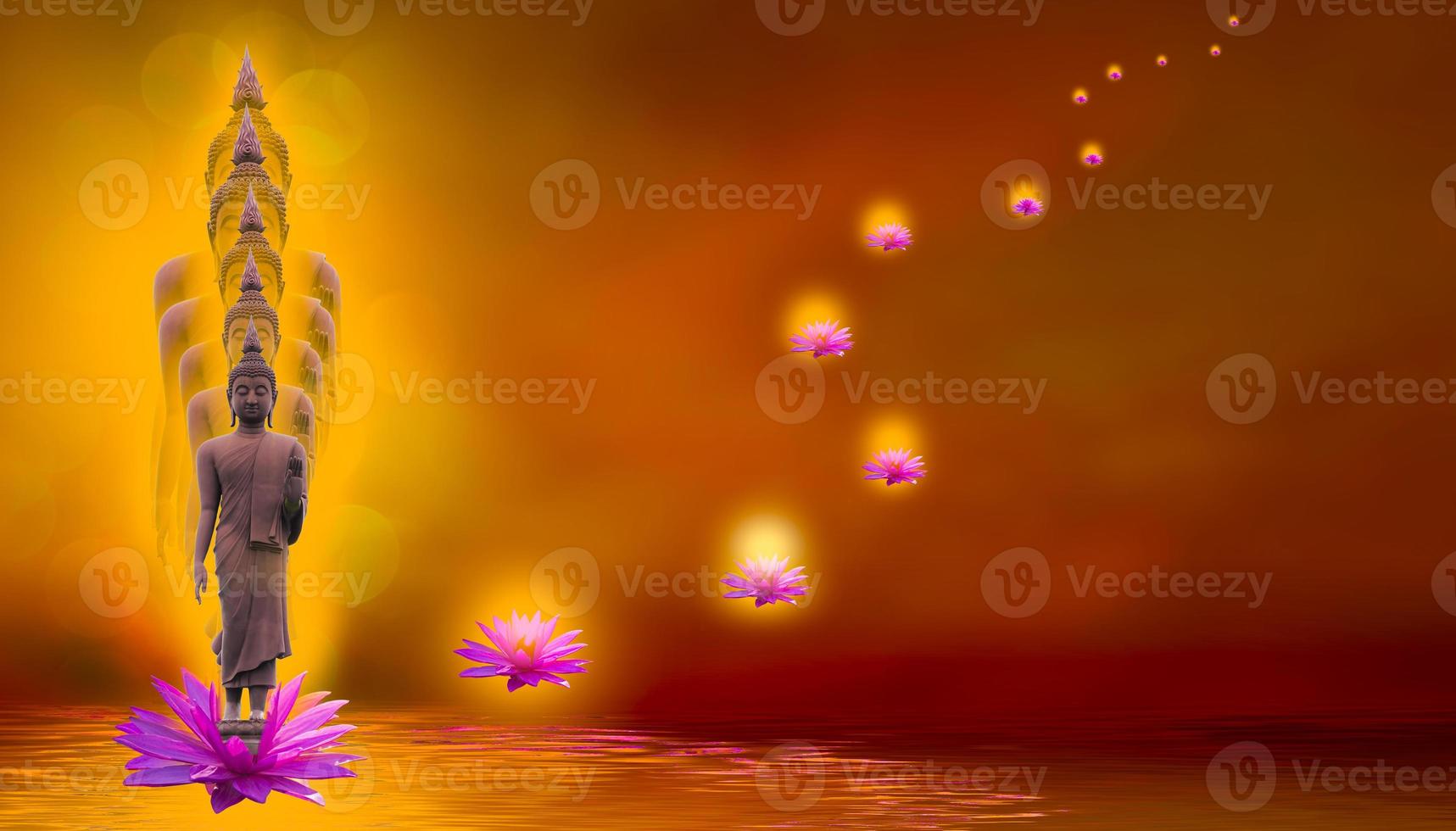 The Buddha stands gracefully on a lotus flower with an orange background. About Buddhism photo