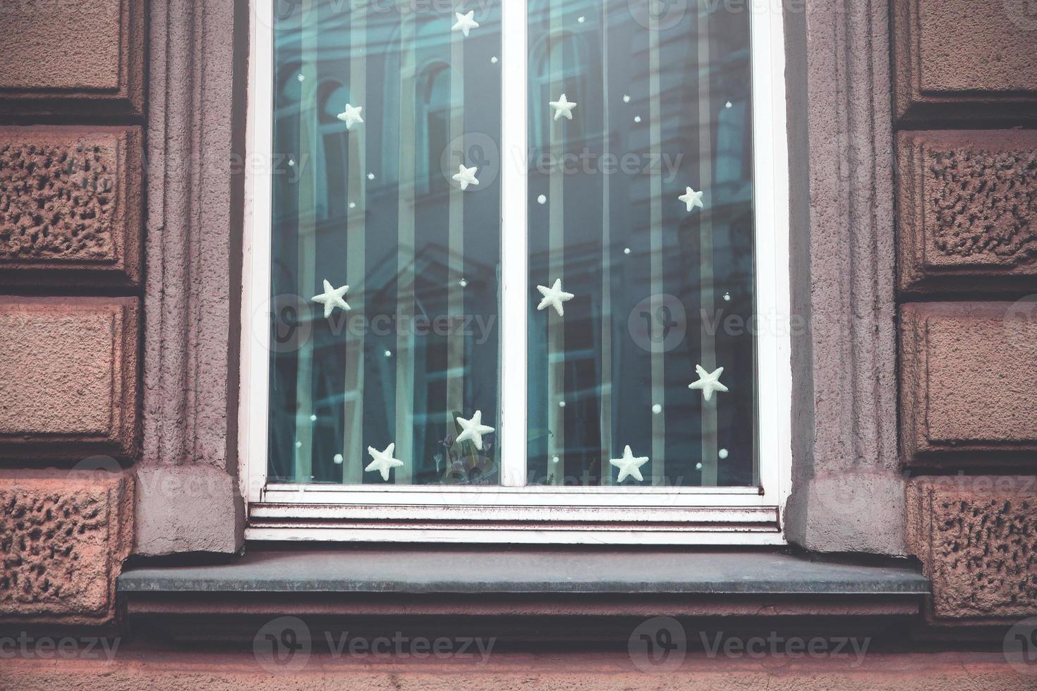 Fairy tale window in soft light with stars photo
