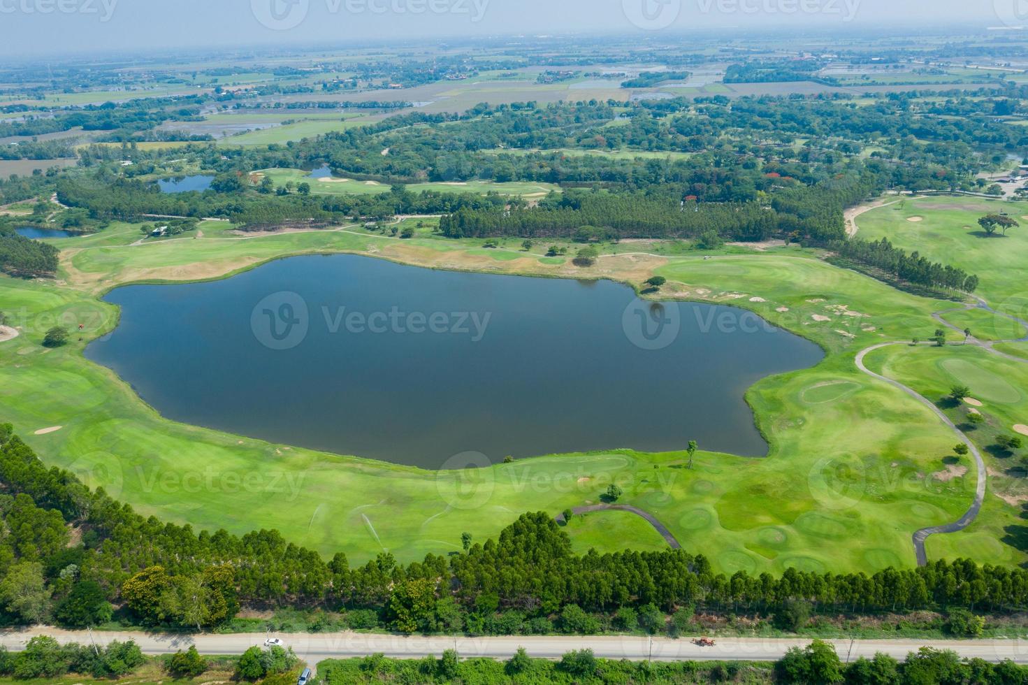 High angle golf course with nature background photo