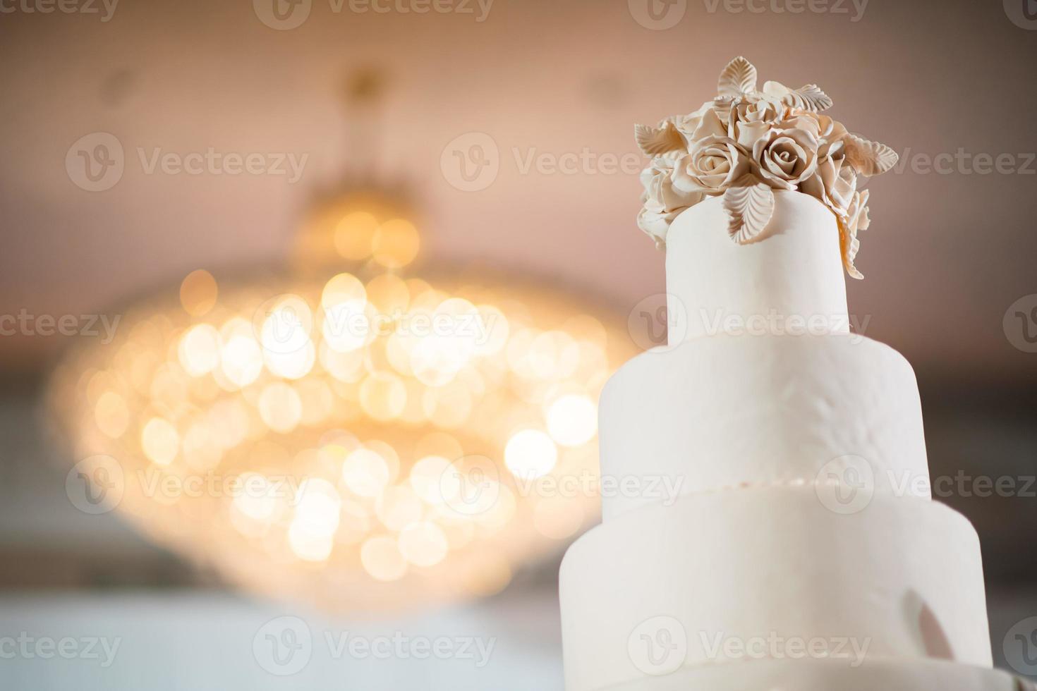 Beautiful wedding cake with blur background photo