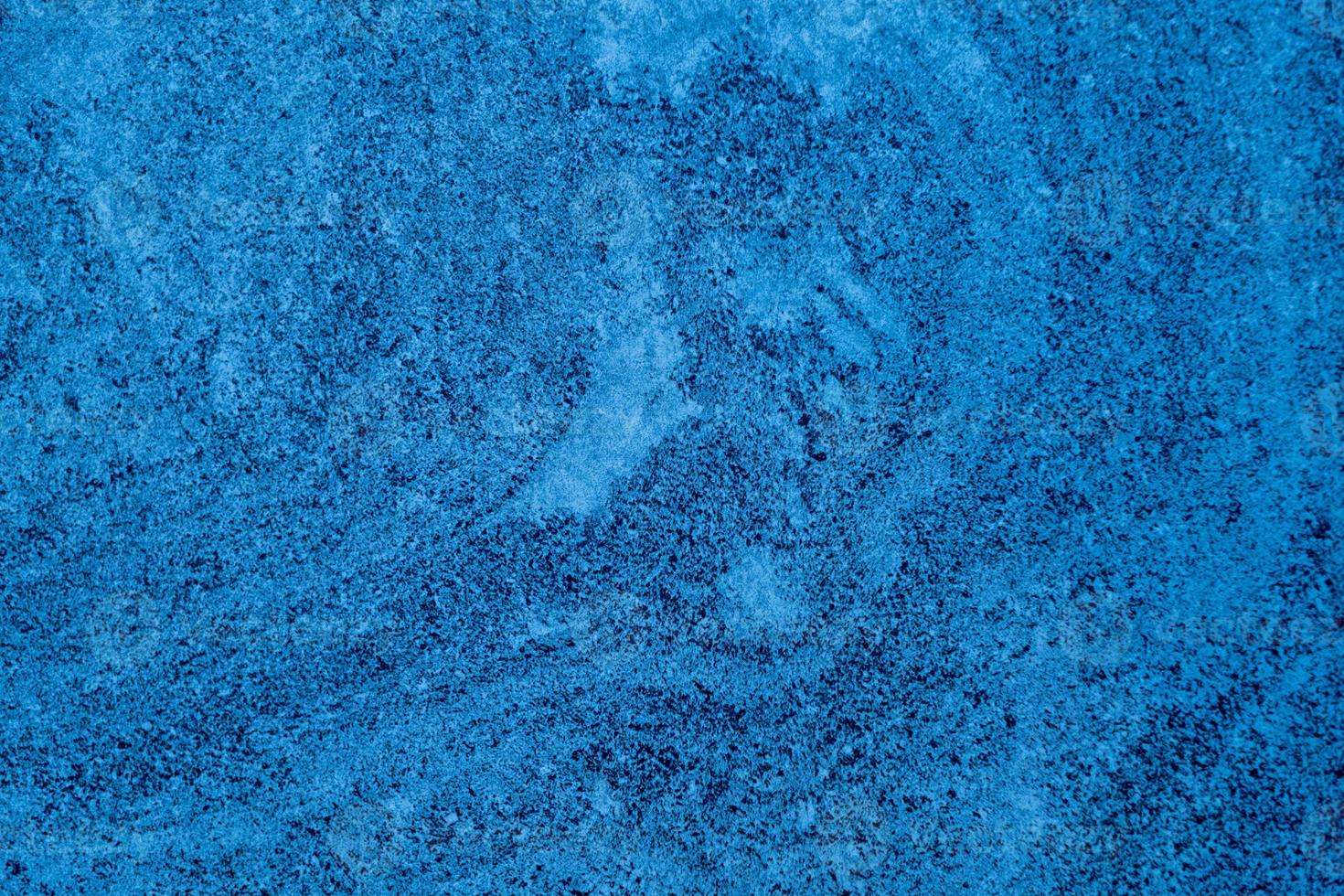 Fondo de mortero azul, textura de cemento foto