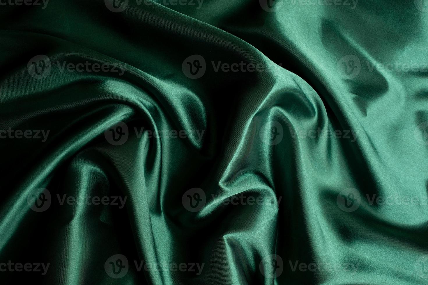 Green fabric texture background, abstract, closeup texture of cloth photo