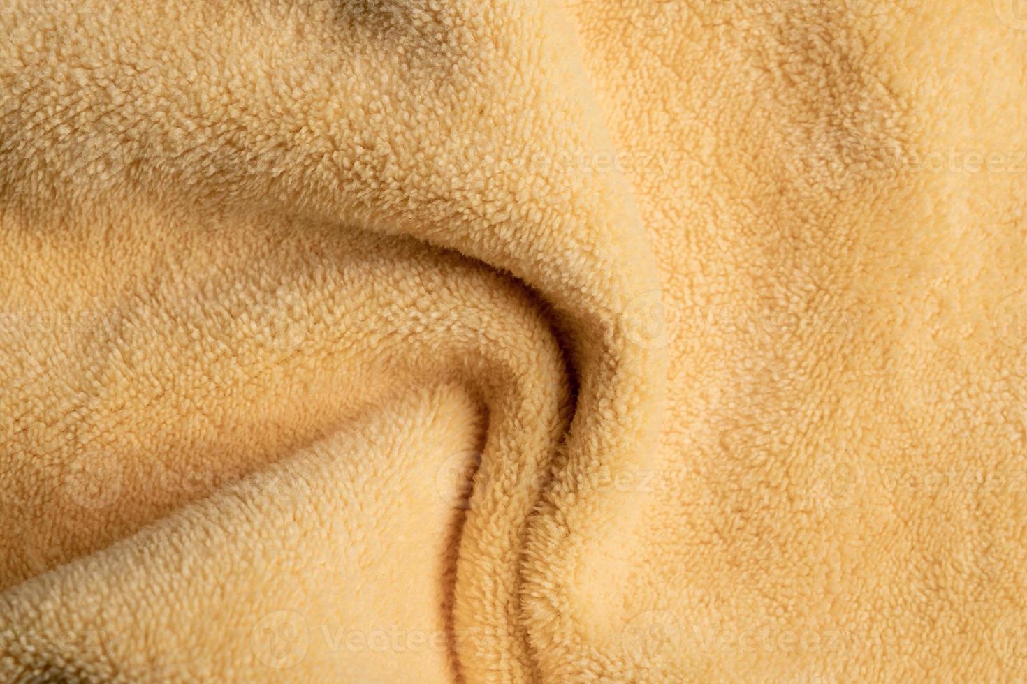 Yellow fabric texture background, abstract, closeup texture of cloth photo