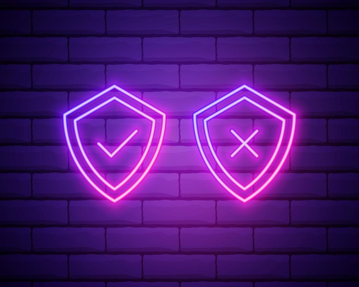 Glowing neon Shield with check and cross mark icon isolated on brick wall background. Protection symbol. Security check Icon. Tick mark approved icon. Vector Illustration