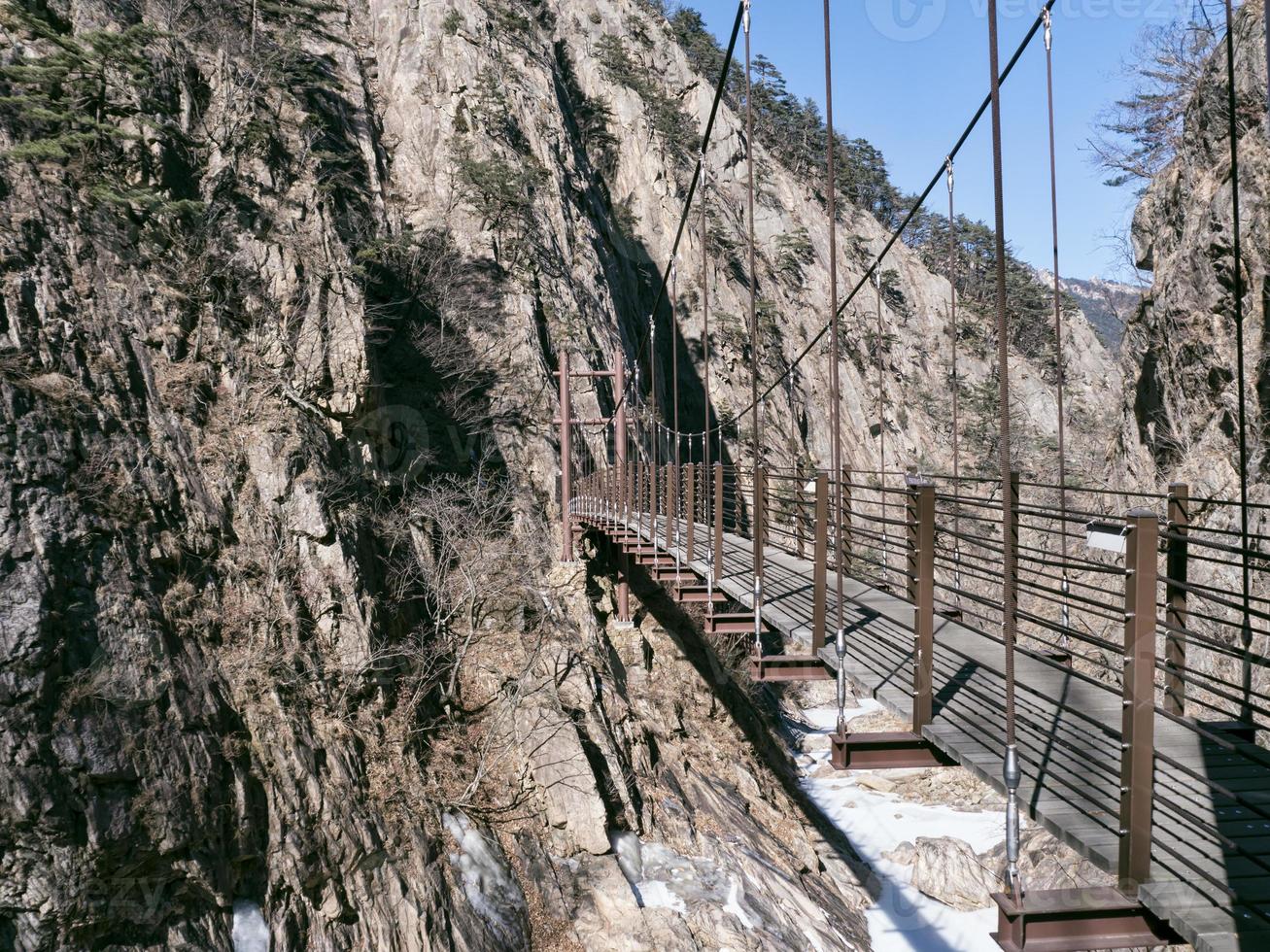 Suspension bridge in the beautiful mountains Seoraksan. Side view photo