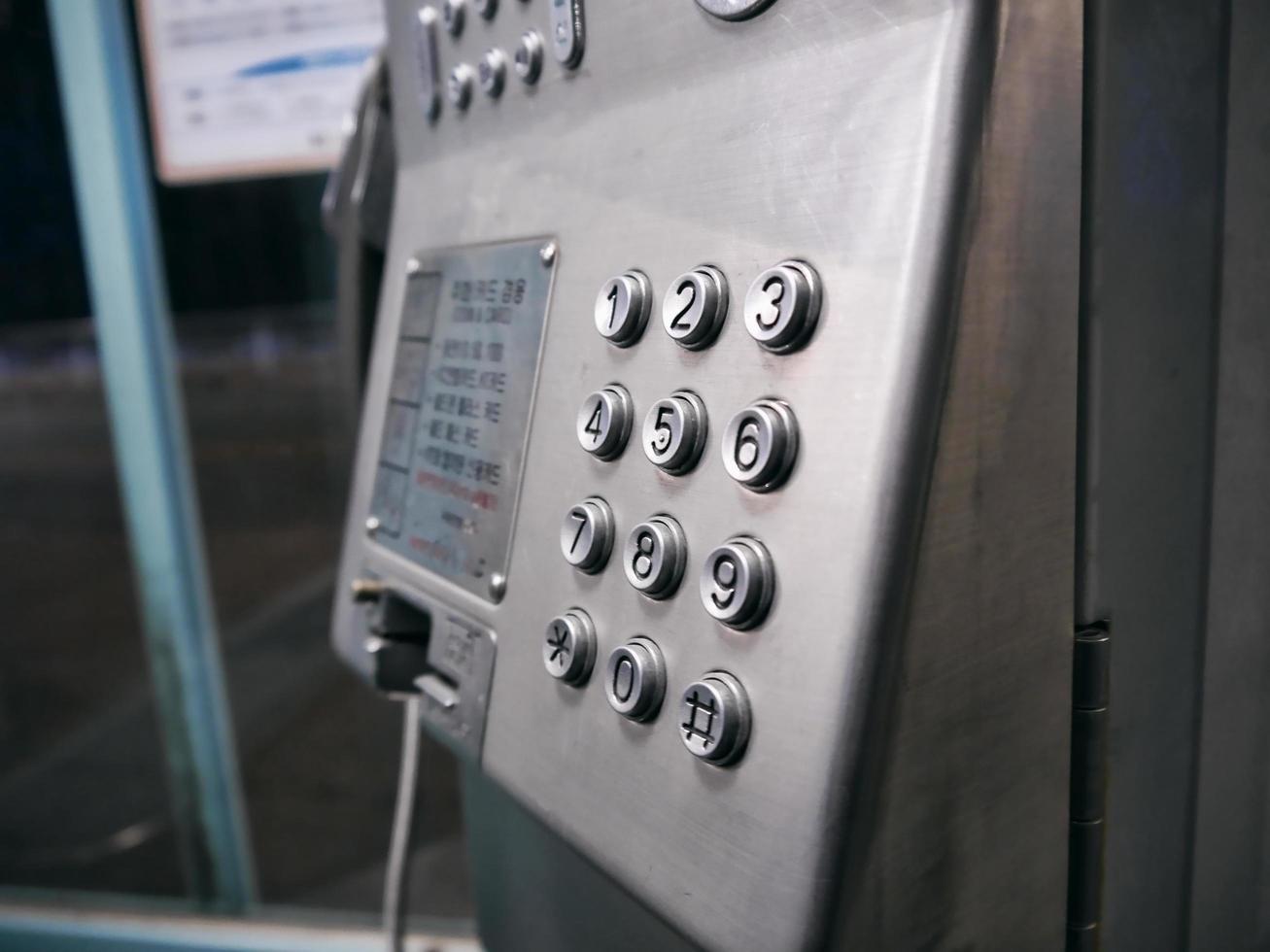 Buttons on the telephone booth in the phone booth photo