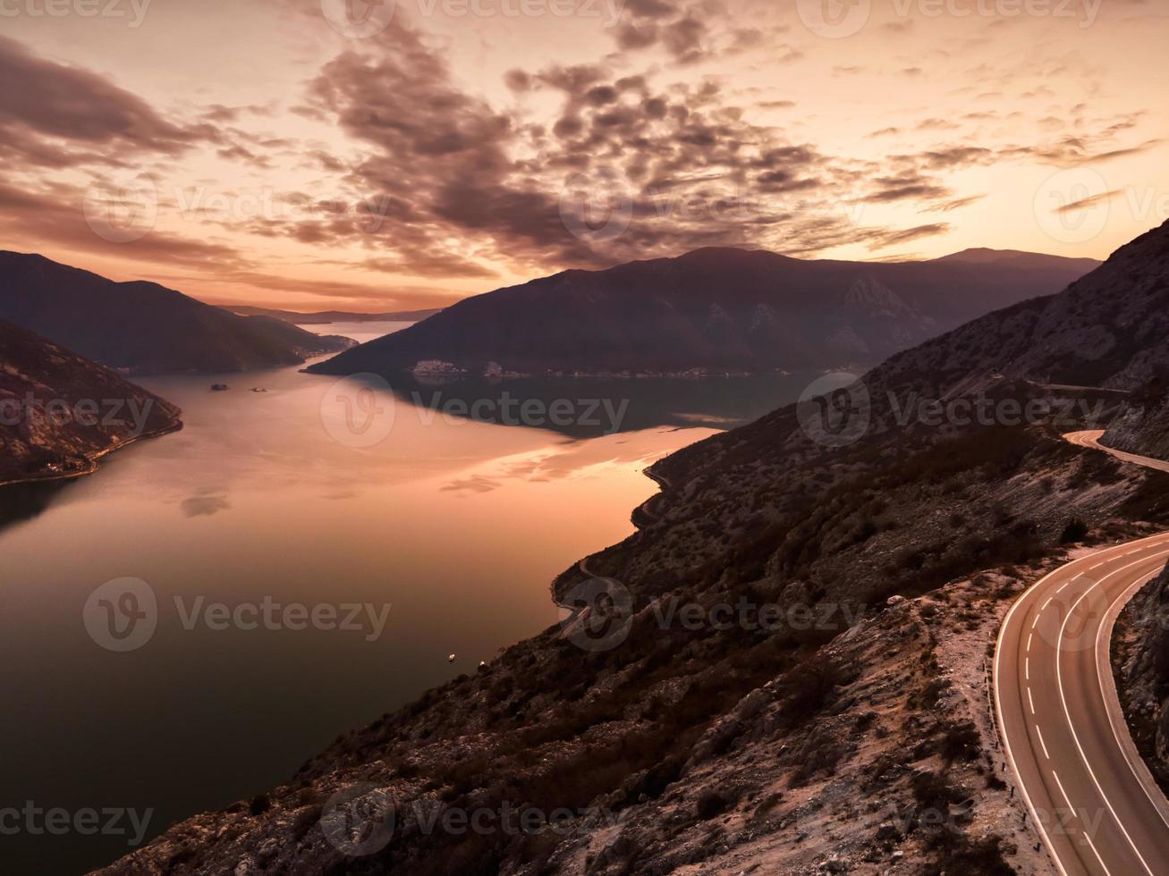 Aerial photography of Boka Bay in Montenegro, Europe at sunset time photo