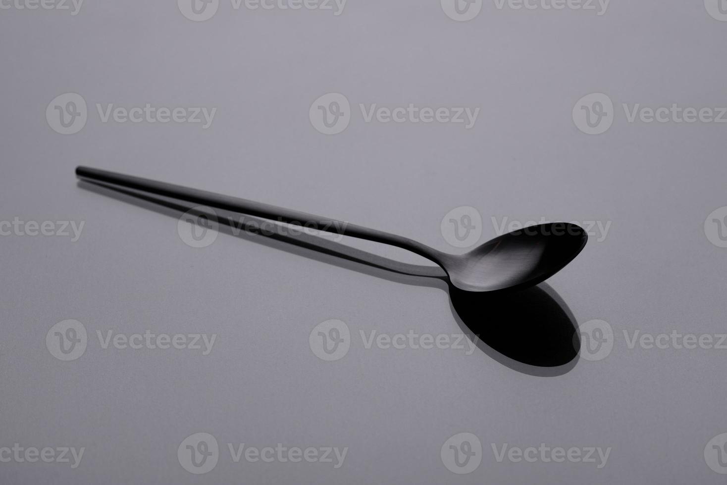 Cutlery on a gray background with shadow. Table serving photo