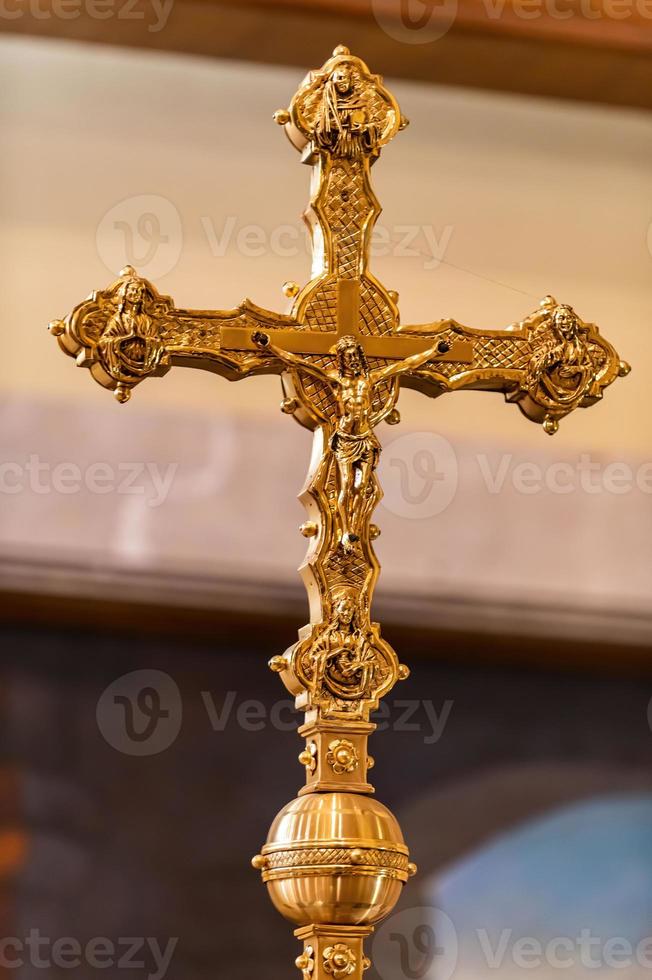 Ancient crucifix with jesus in gold photo