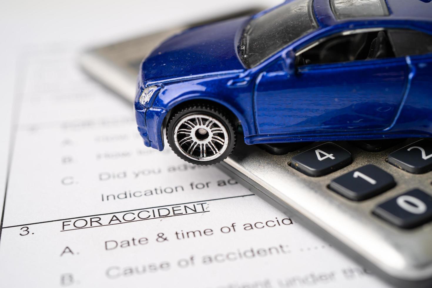 Car on Insurance claim accident car form background, Car loan, Finance, saving money, insurance and leasing time concepts. photo