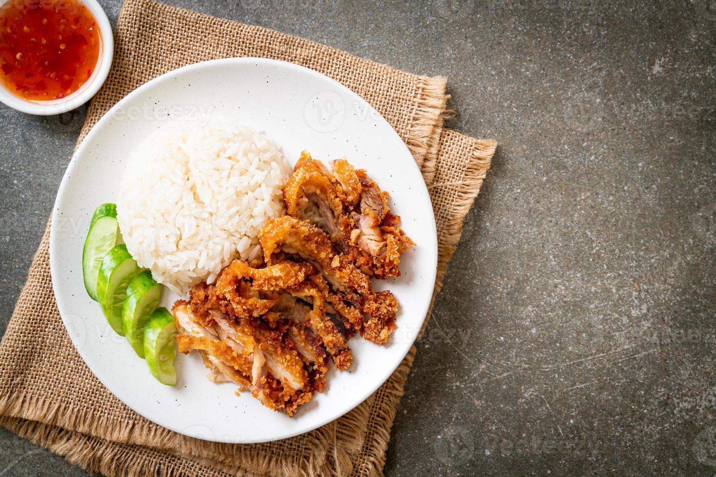 Hainanese chicken rice with fried chicken photo