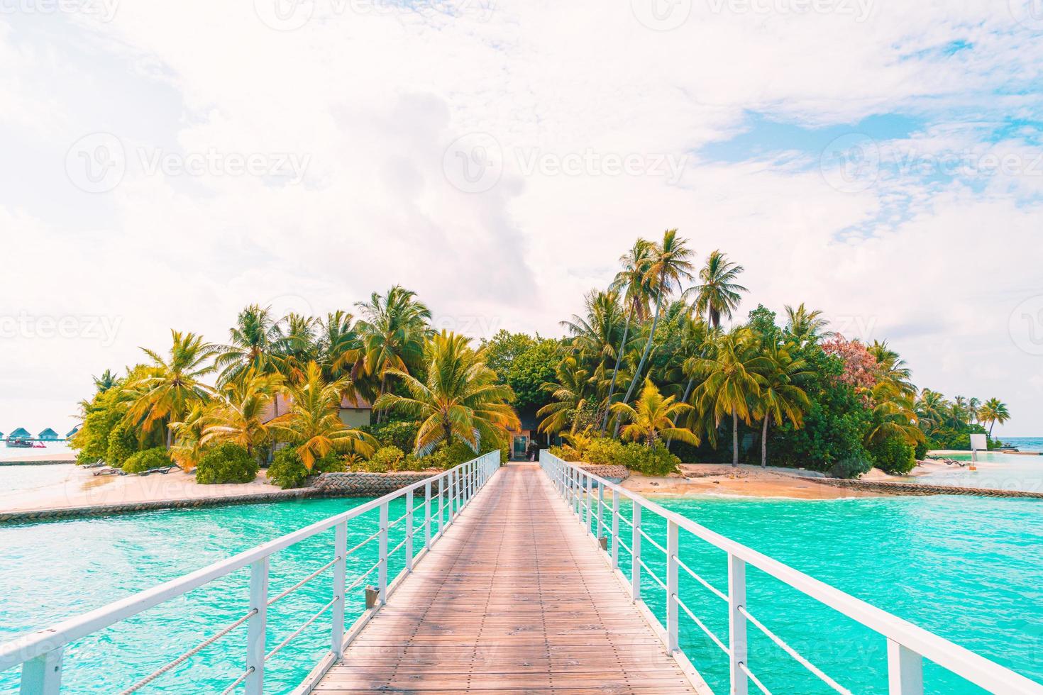 Beautiful tropical Maldives resort hotel and island with beach and sea photo