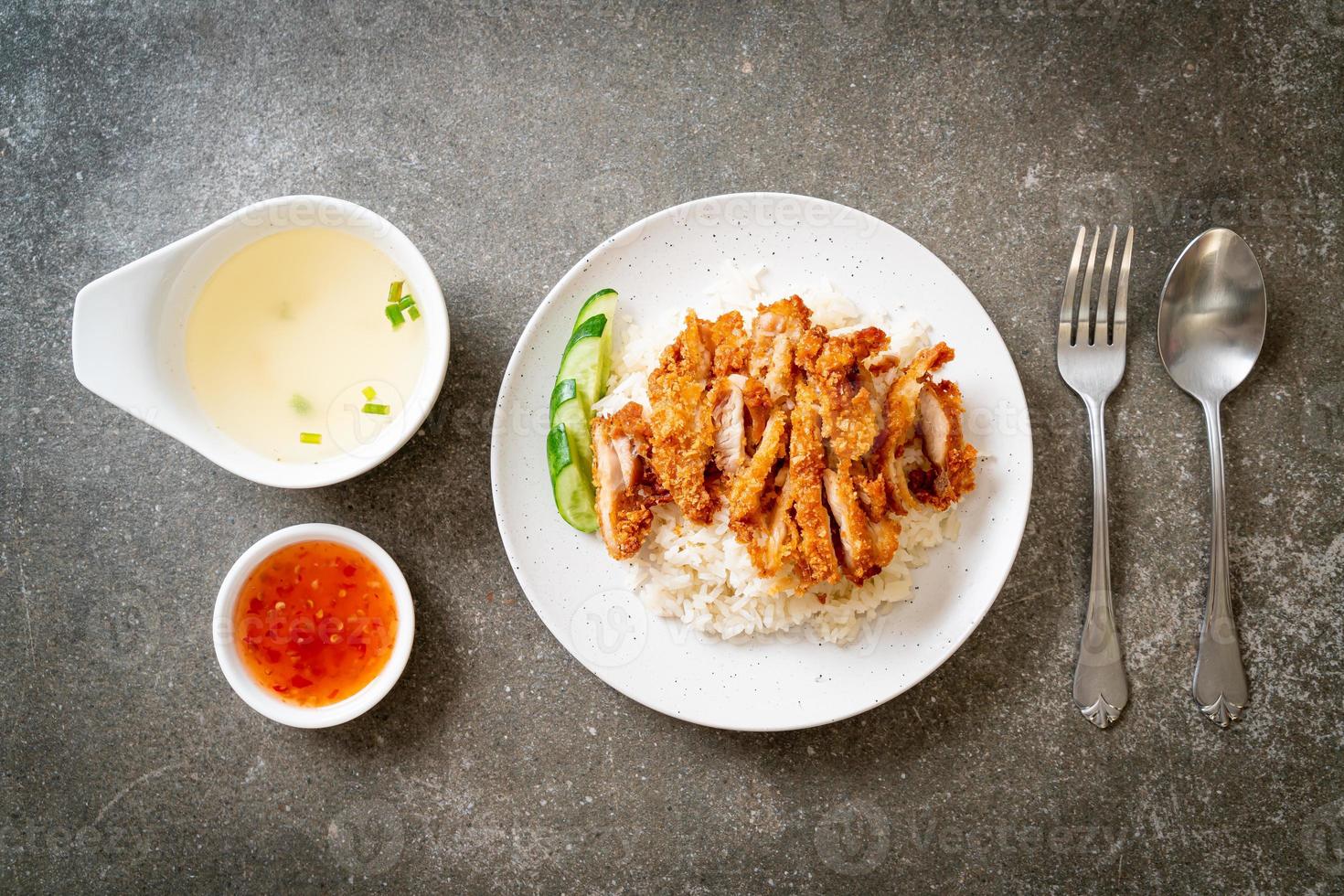Hainanese chicken rice with fried chicken photo