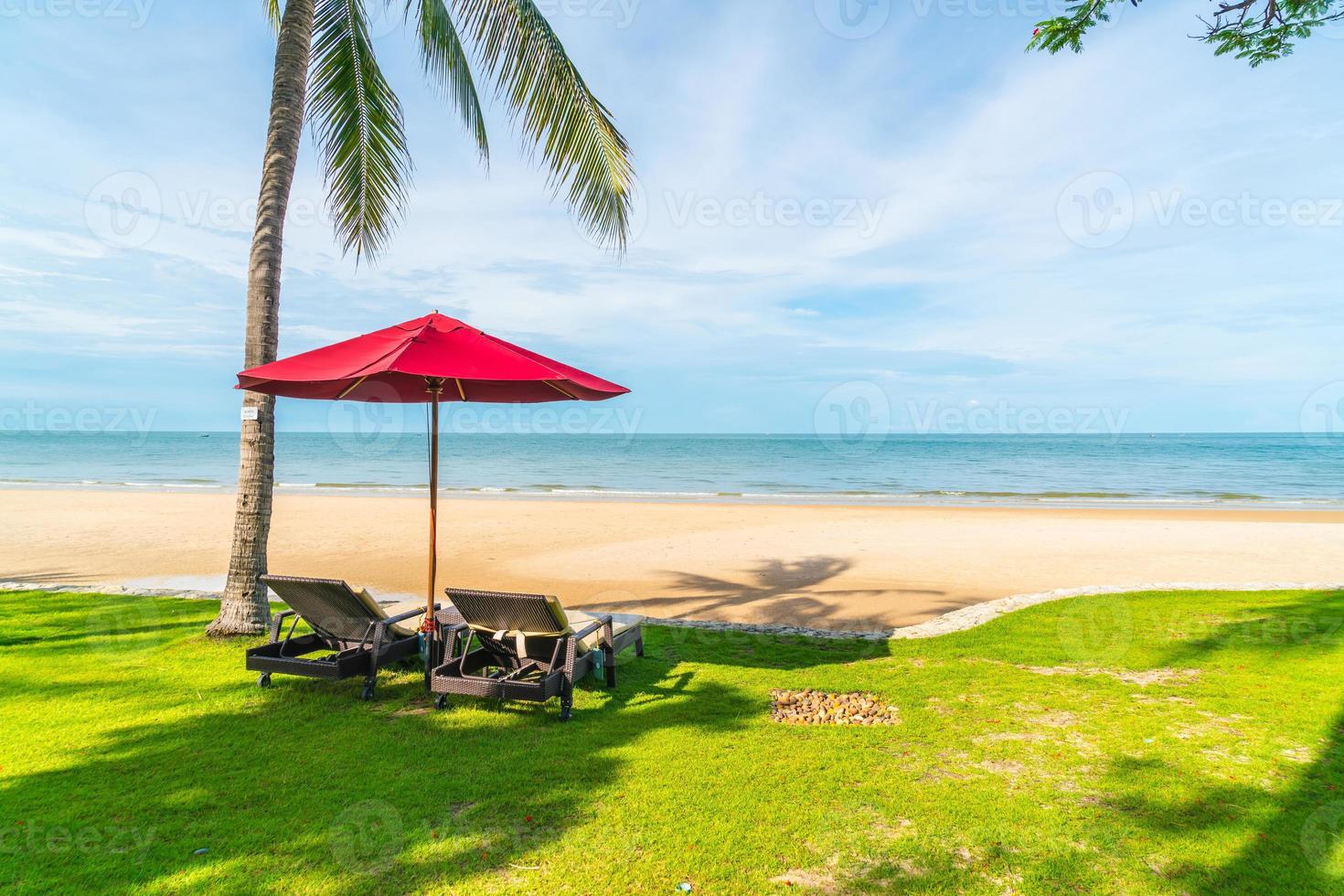 Umbrella and chair  with sea ocean view in hotel resort photo