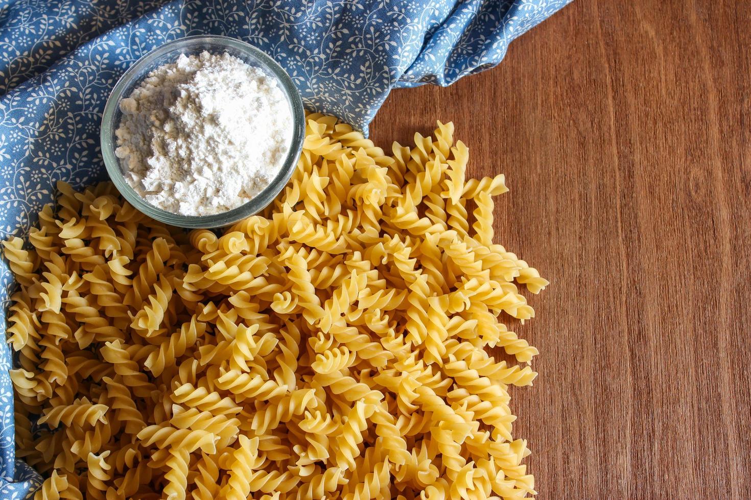 Phillips' raw pasta on a wooden background photo