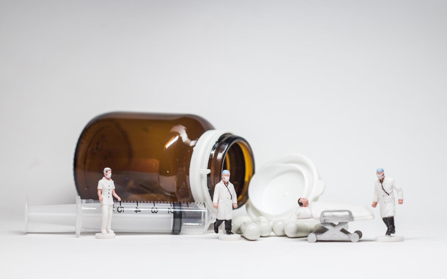 Simple Conceptual Photo, Mini figure doctors and nurses mini figure evacuation of infected patients photo