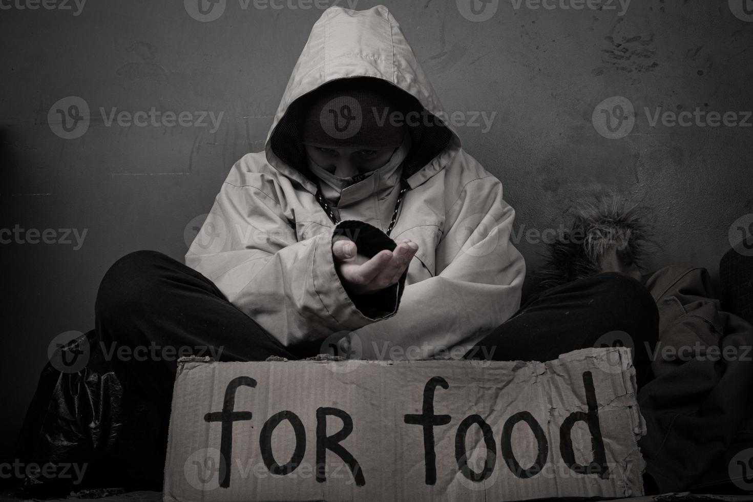Homeless person asks for help with food photo