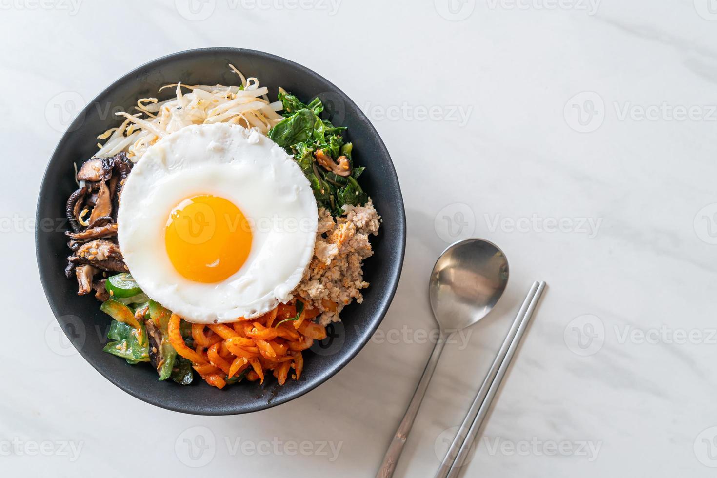 Korean spicy salad with rice - traditionally Korean food, Bibimbap photo